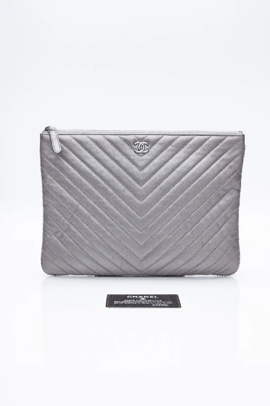 CHANEL Silver Chevron Quilted Lambskin O Case Clutch